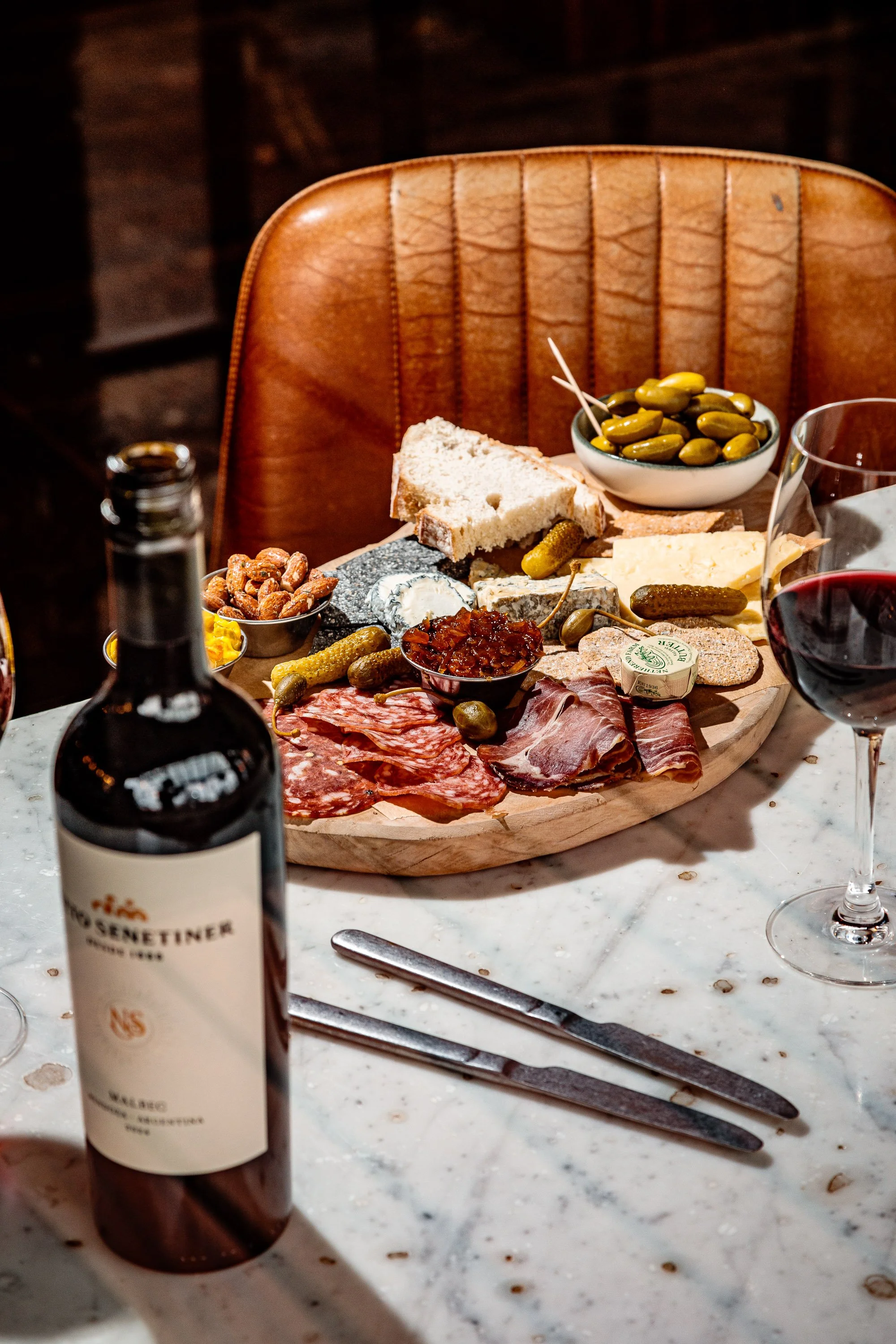 Charcuterie board and red wine at Wallop Didsbury