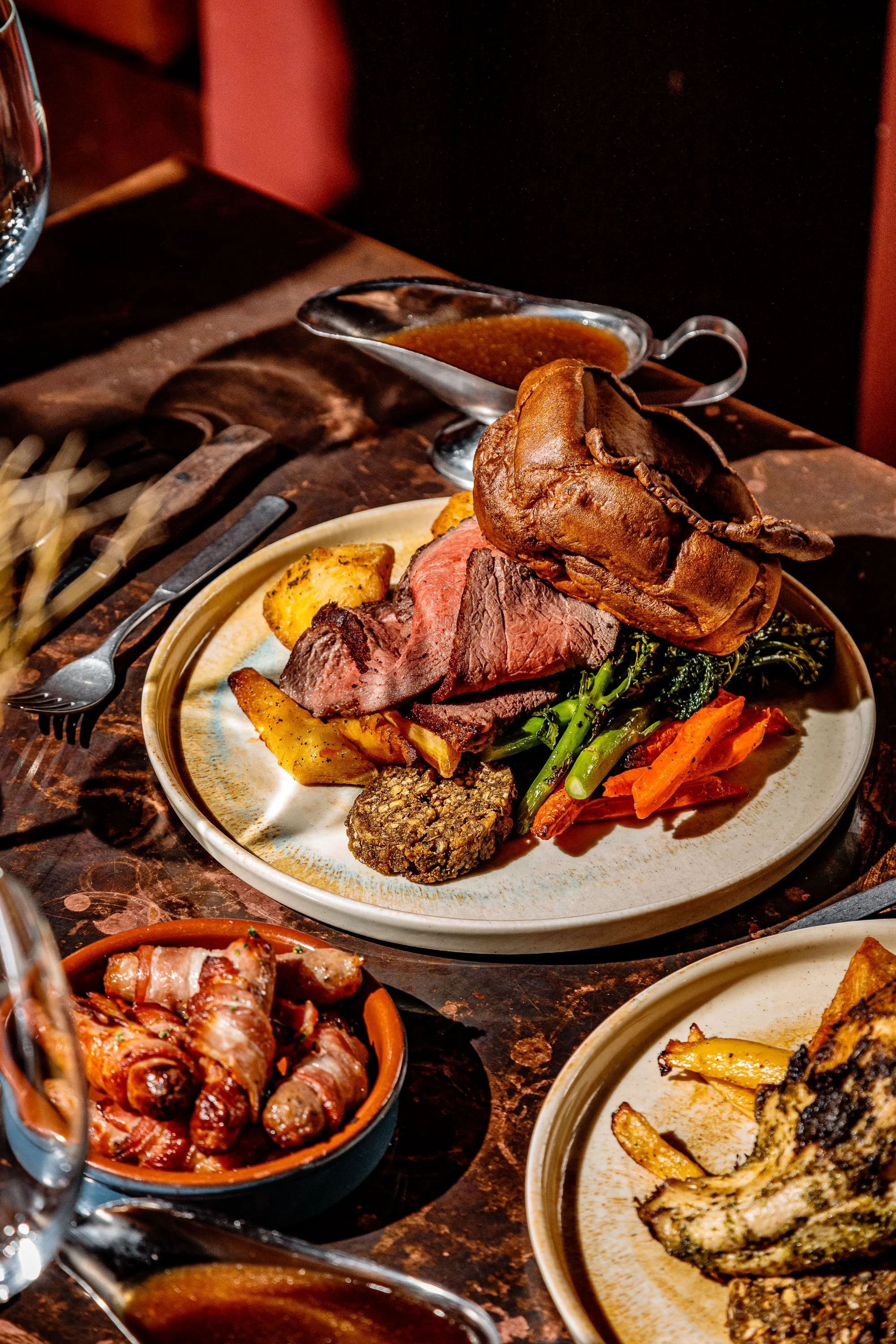Beef topside, Yorkshire pudding,, seasonal vegetables, stuffing and crispy roast potatoes at Wallop