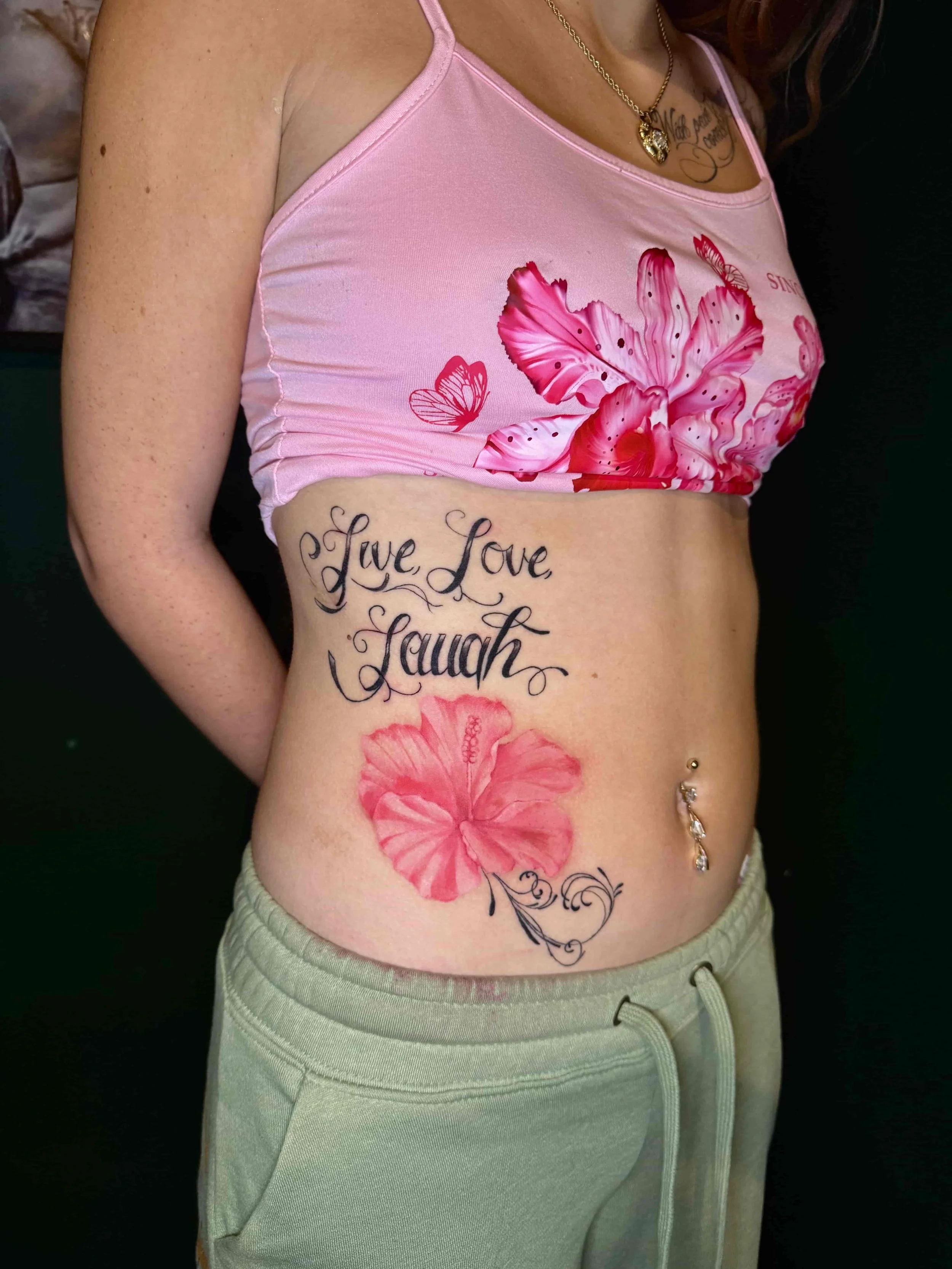 pink hibiscus flower tattoo.jpeg
