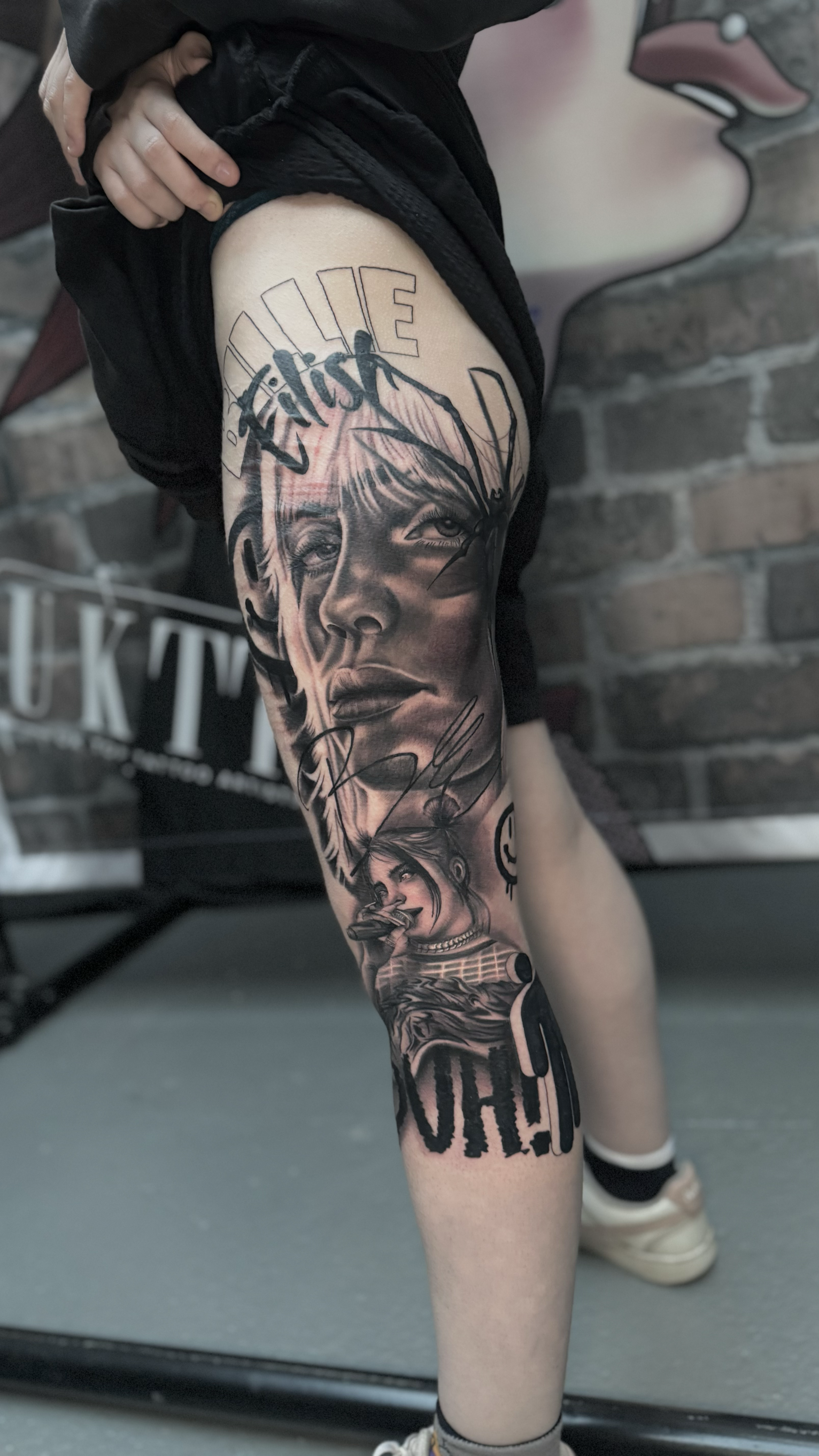 Black and grey realistic Billie Eilish portrait leg sleeve tattoo, by Harry Devlin, Devlin Ink Tattoos Colchester