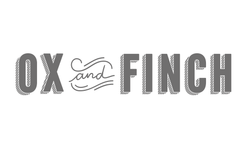Text reading 'OX and FINCH' in a logo style