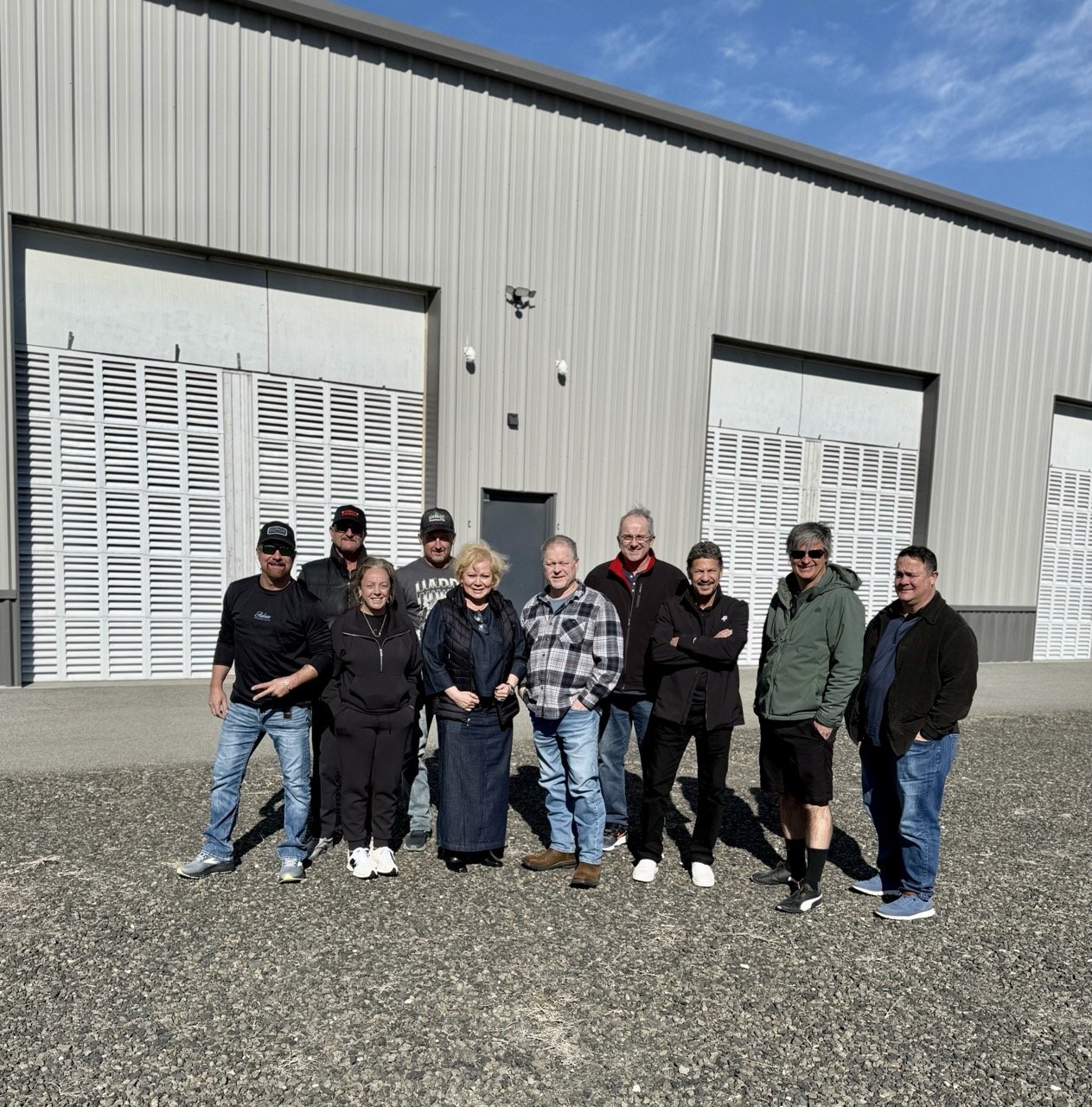 Reyna, Ruben & Joe with Key Members outside the MUSA Wenatchee Data Center