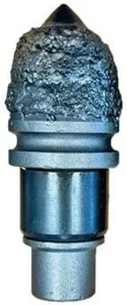 Close-up of a worn, black-edged drill bit or tool tip with a textured, rough surface.