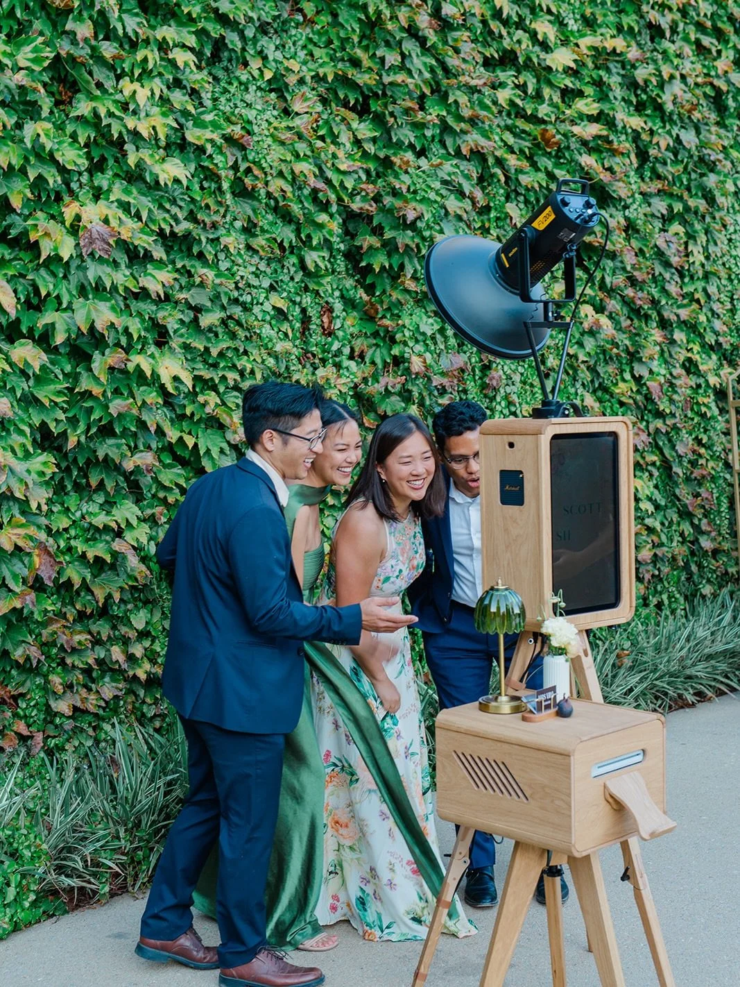 This can be you on your wedding day with your guests! 💛Visit our website to inquire about our Vintage Honey Wood Photo Booth! 

Beautiful photo taken by @kamarinann_photo 📸

#wedding #weddingphotobooth #photoboothrental #weddinginspo #weddinginspir