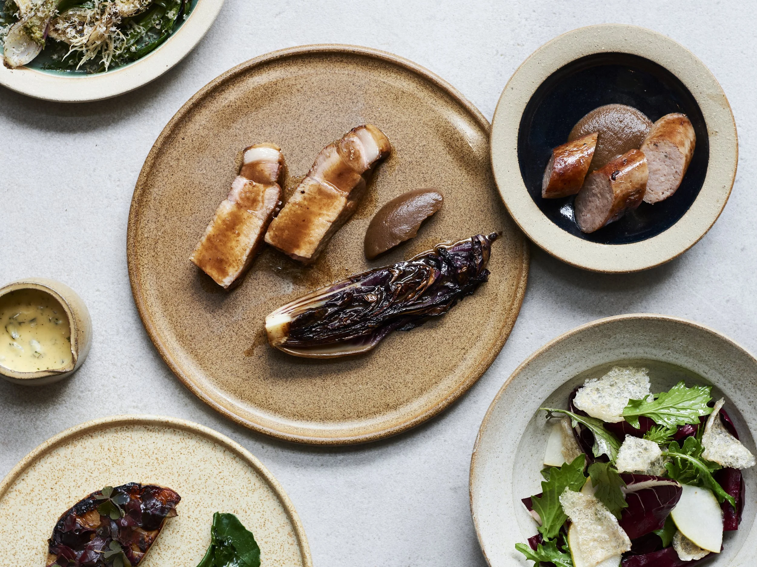 Main dishes spread out on a table