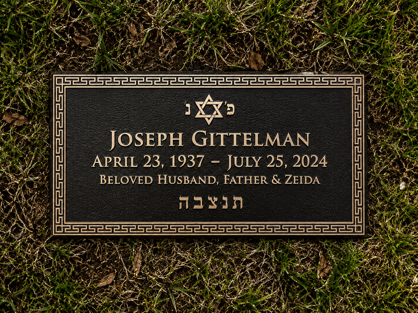Gravestone with black background and gold border, inscribed with the name Joseph Gittelman, birth date April 23, 1937, death date July 25, 2024, and words 'Beloved Husband, Father & Zeida' in English and Hebrew, with a Star of David at the top center.