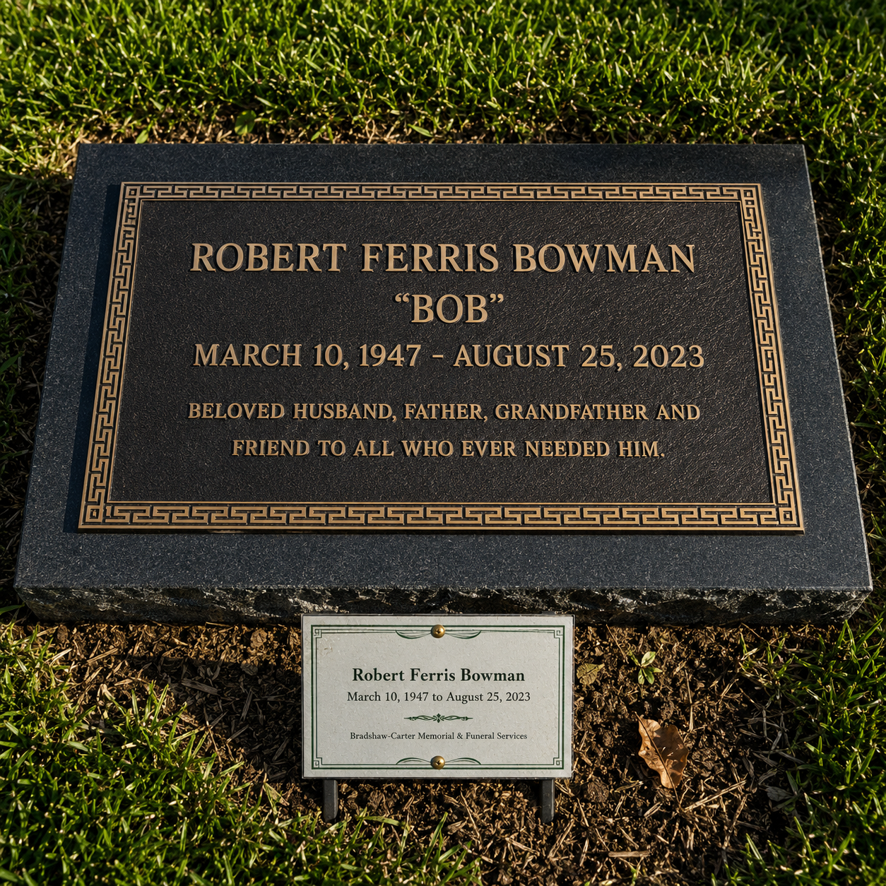 Gravestone for Robert Ferris Bowman, with dates March 10, 1947, to August 25, 2023, surrounded by grass, with a small memorial plaque below.