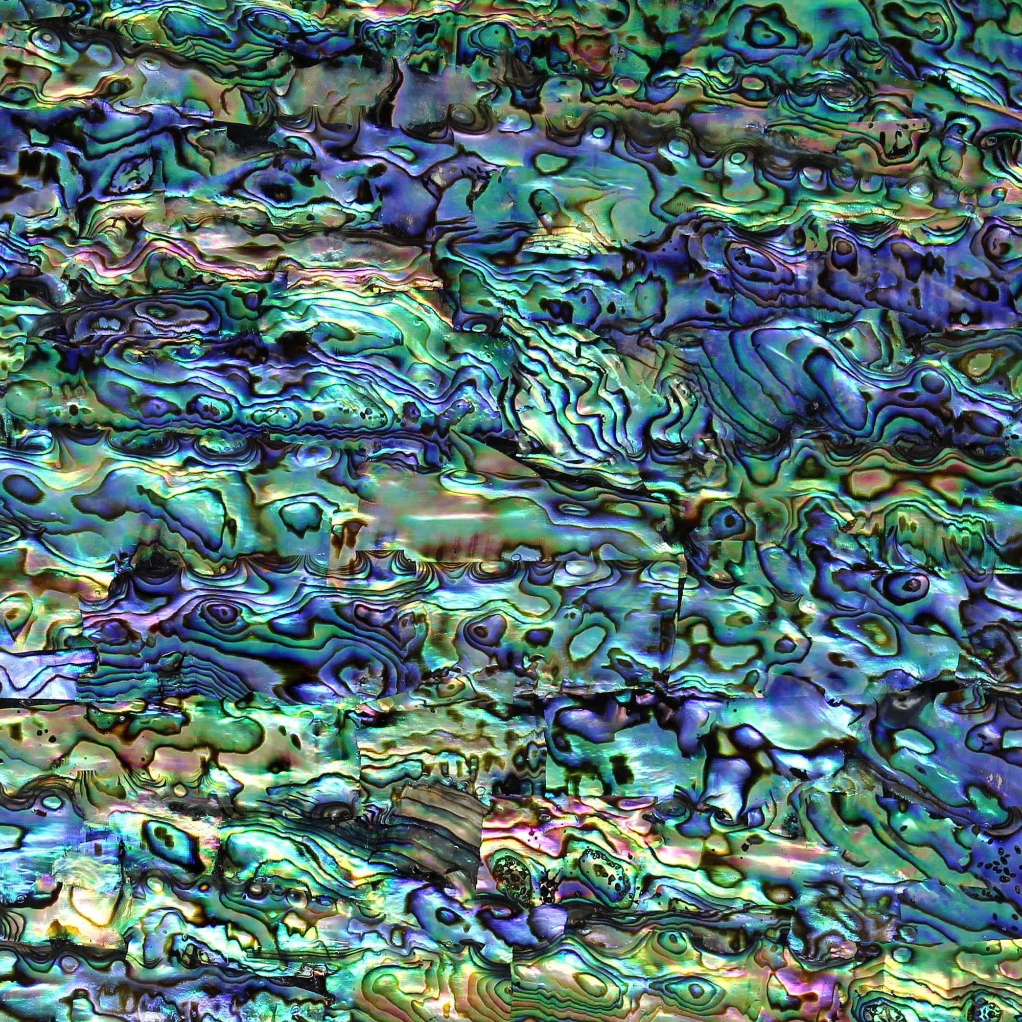 Abstract multicolored swirling pattern resembling an oil slick.