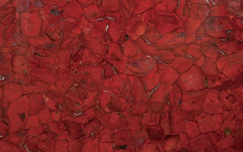 Close-up of tree bark painted red.