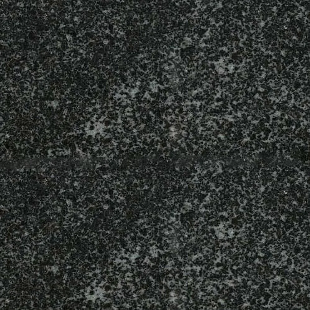 Close-up of a black granite surface with gray speckles.