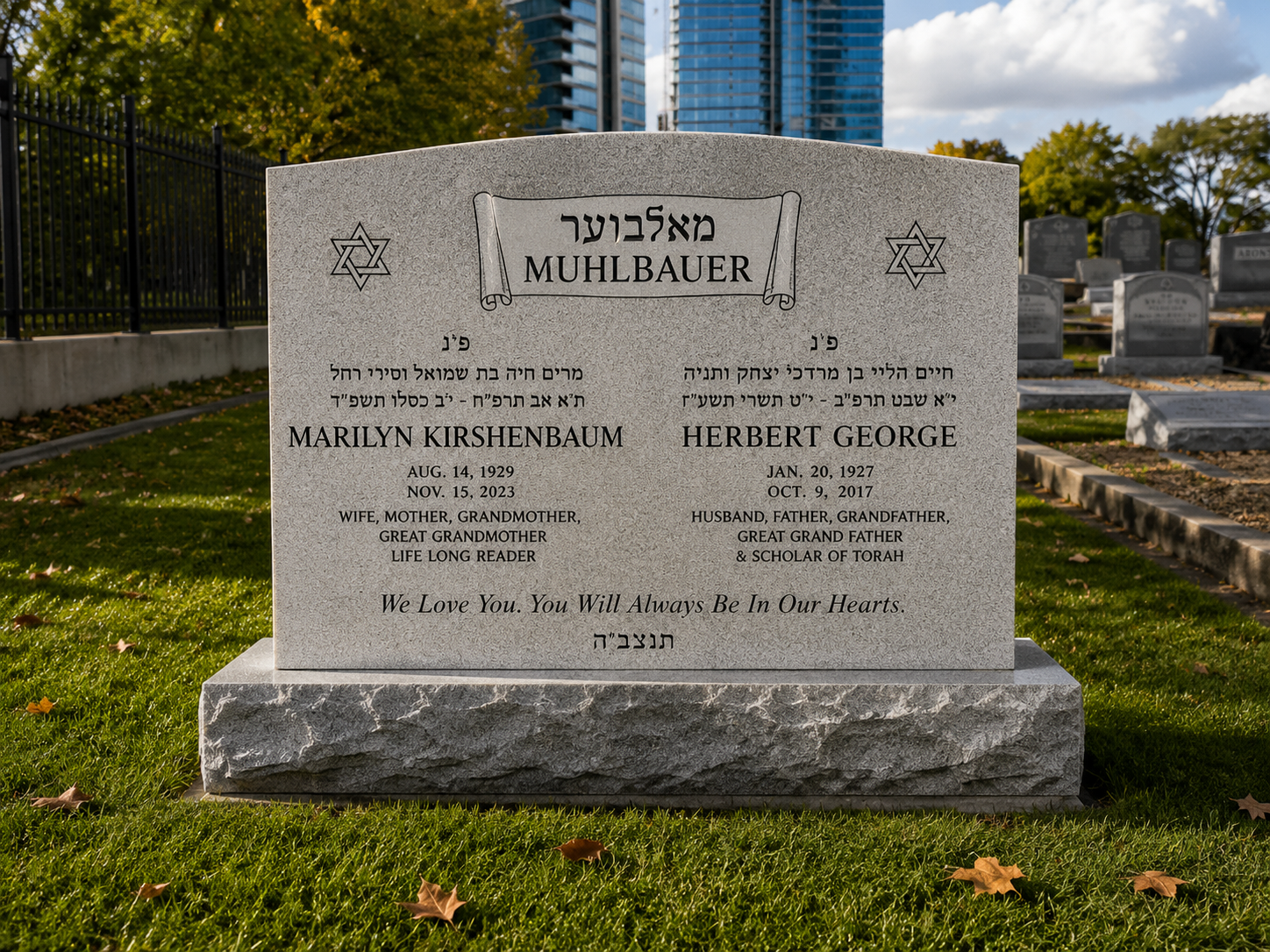 Gravestone with Hebrew and English inscriptions, dedicated to Herbert George and Marilyn Kirshenbaum, in a cemetery with grass, trees, and tall buildings in the background.