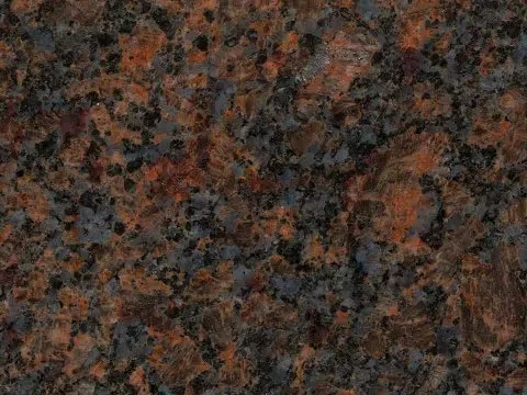 Close-up of a dark, speckled granite countertop.
