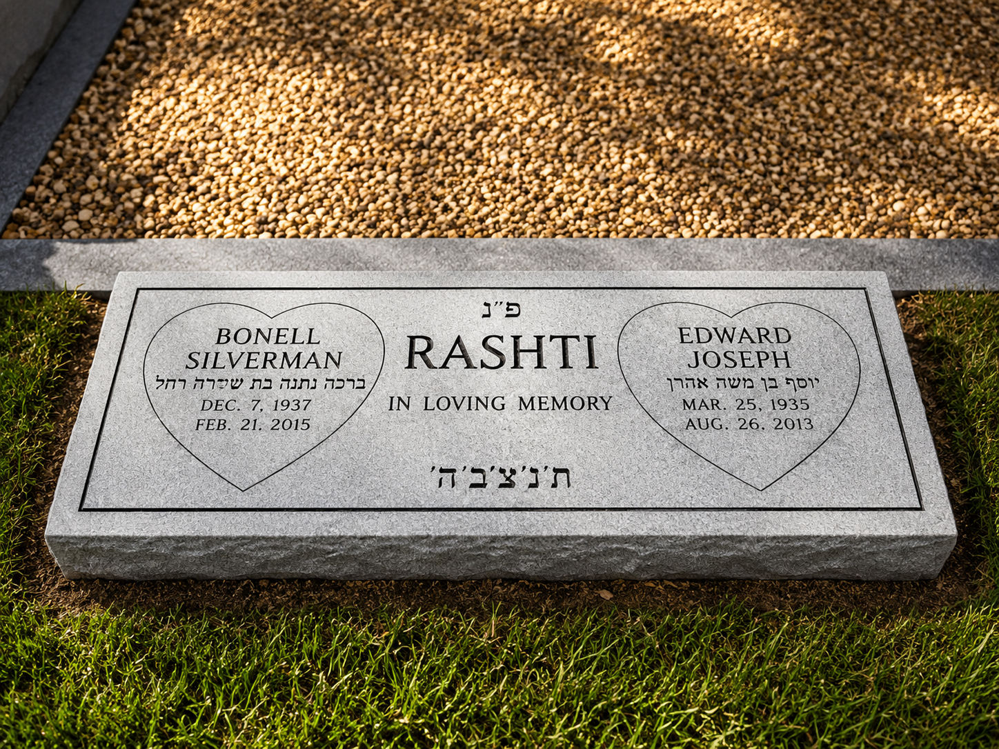 Gravestone with two hearts containing names and dates of a couple, Bonell Silverman and Edward Joseph, in a cemetery.