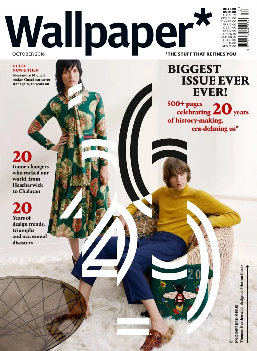 Cover of Wallpaper magazine, October 2016, featuring a model in a floral dress and a young man in a mustard sweater, with graphic white and black design elements overlaid on the image.