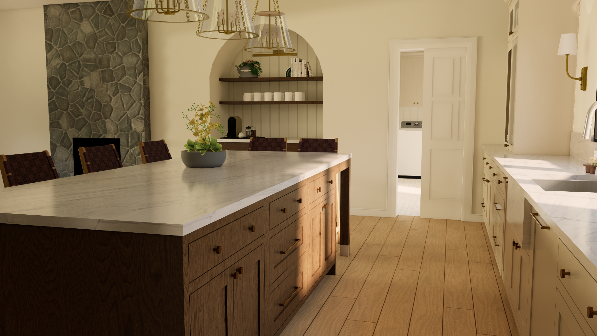 A kitchen with a large white marble island, wooden cabinets, and a stone wall in the background. There are hanging pendant lights above the island and a potted plant on top. Sunlight streams through a window near the sink.