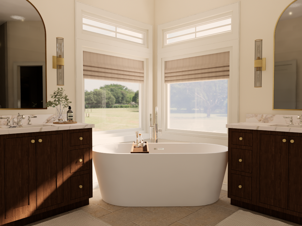 Bathroom featuring a free-standing bathtub between two wooden vanities with marble countertops, large windows with beige Roman shades, and views of a green outdoor area.