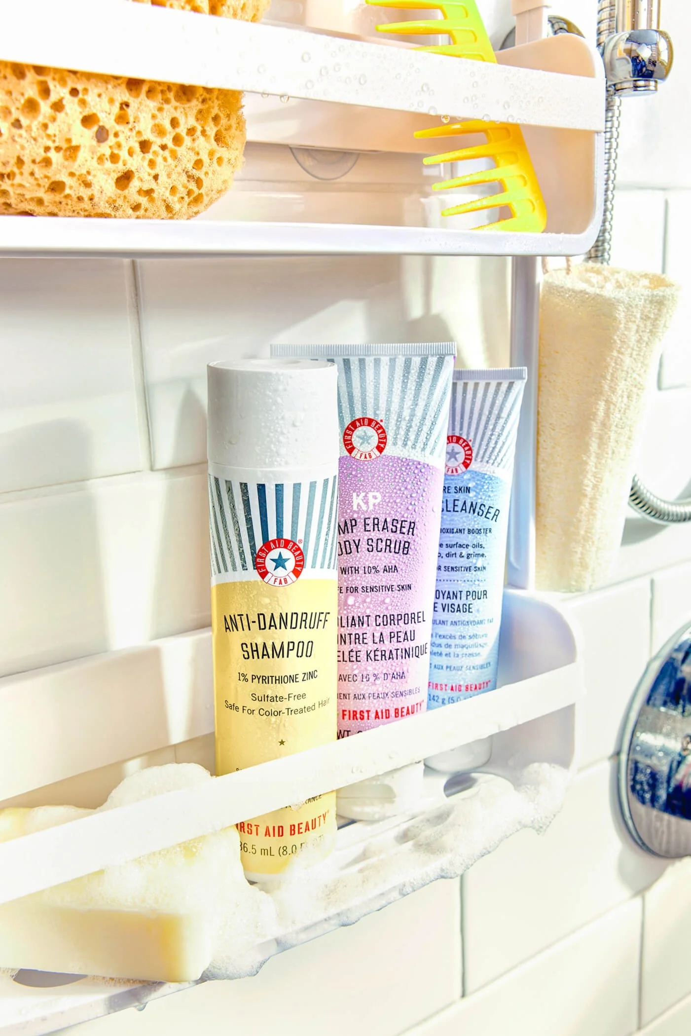 Shower caddy with First Aid Beauty products and bath accessories