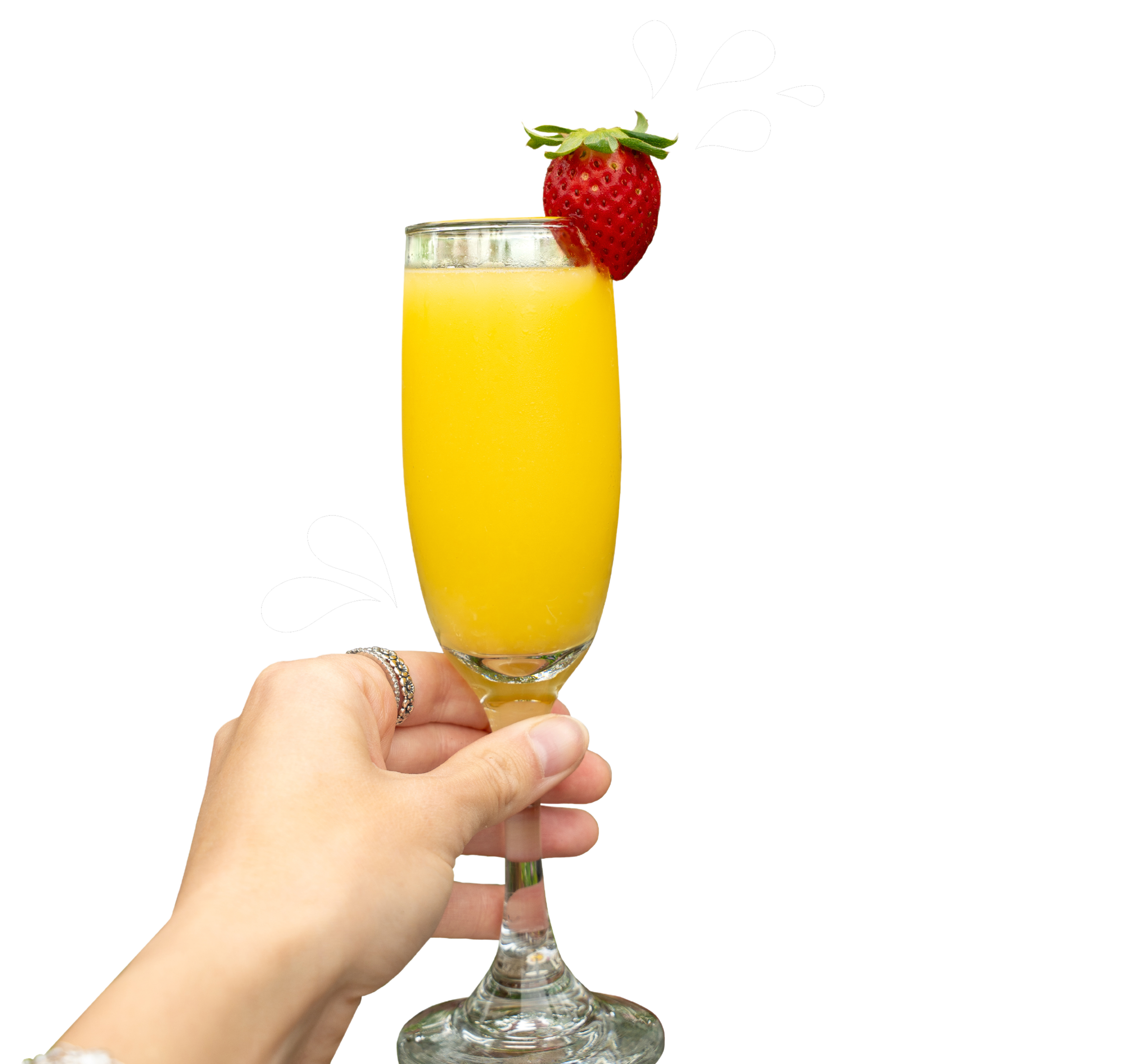 Hand holding a mimos garnished with a strawberry. Brunch drinks on Marco Island, Florida.