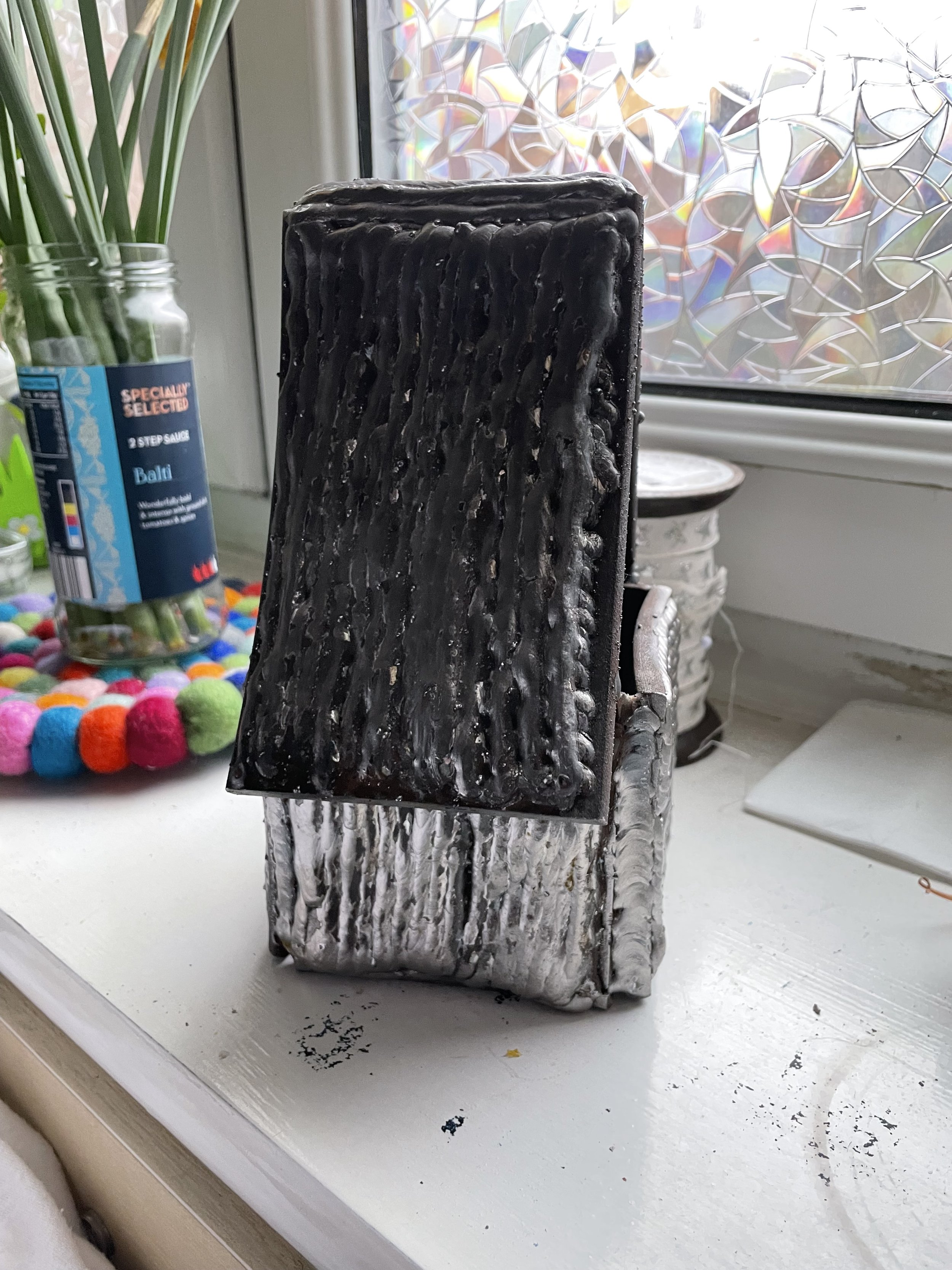 Test pleates welded into a house, Photo by Perrin Dunn, Winter 2023