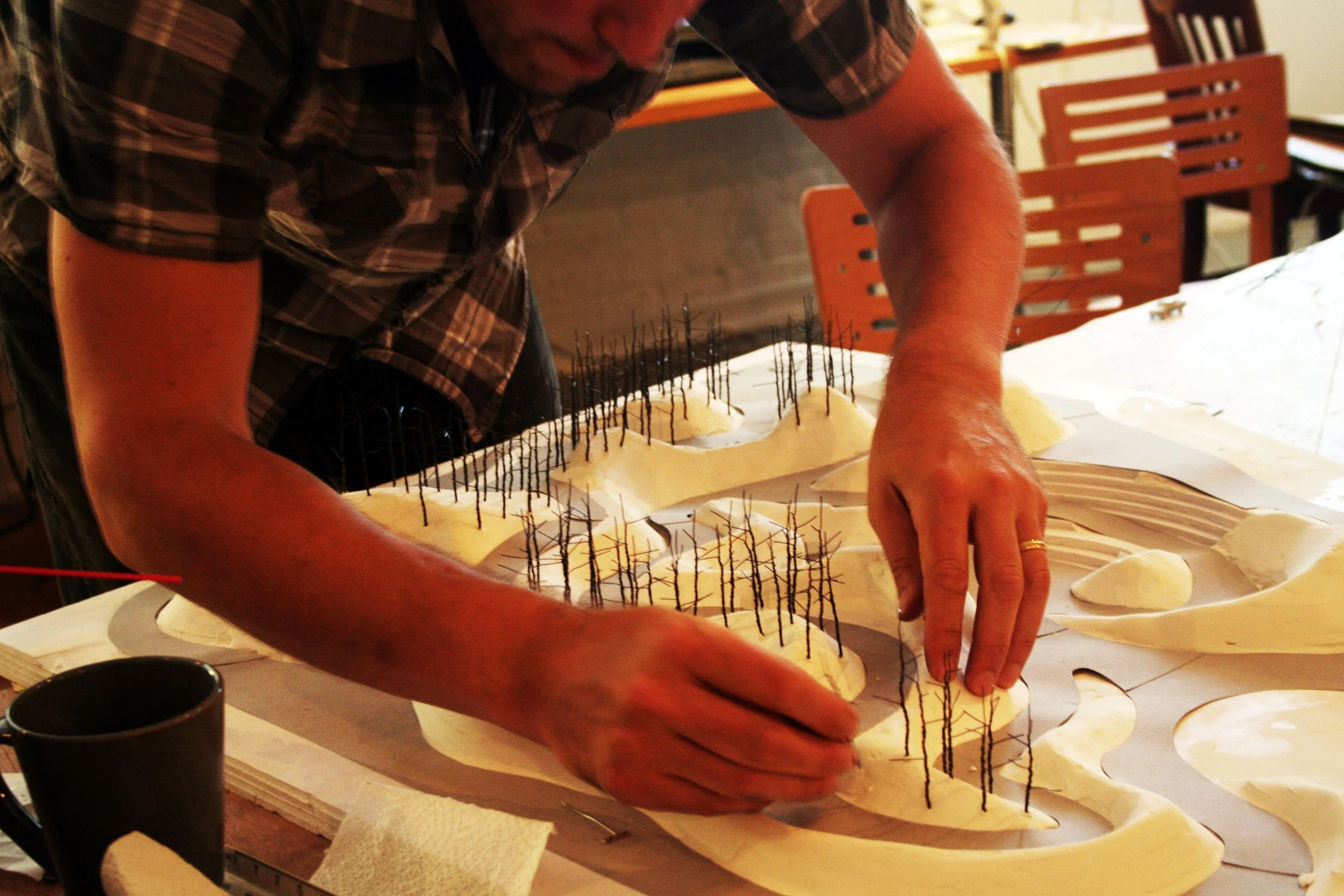 Process image of a planting design concept being developed with a physical model in the studio.