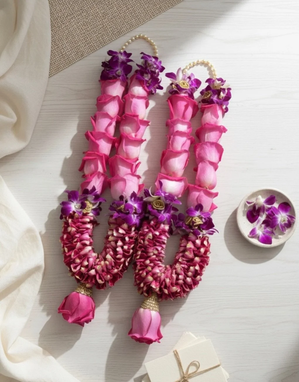 Blush roses wrapped in layers of delicate petals, finished with vibrant orchids for that royal touch 💗✨