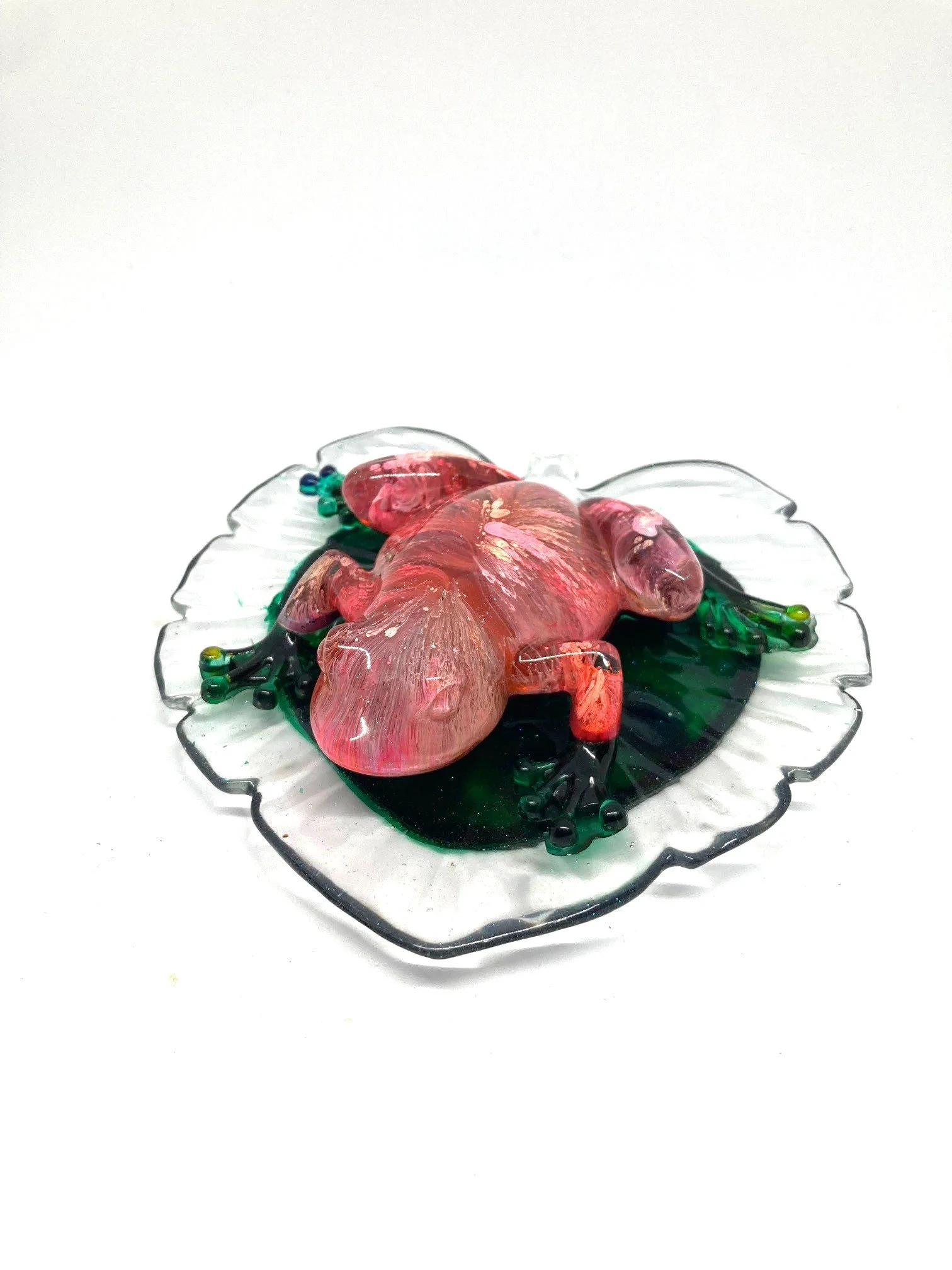 ReasinFigurines_Small_PetriFrogOnSmallLeaf_Pink,WhiteandGreenWithLeaf_FromFront.jpg