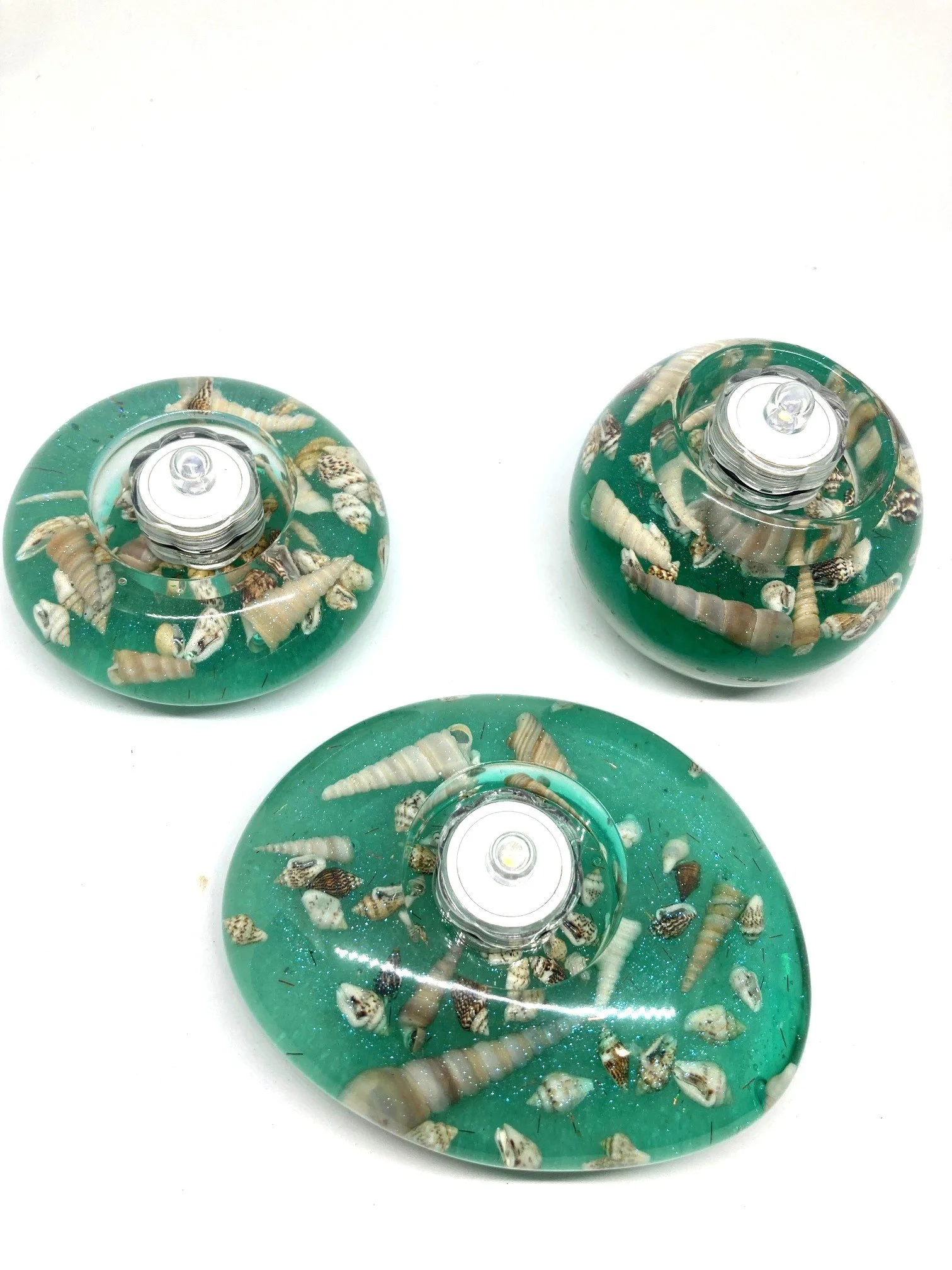 Large Resin Votive_Polished Stones_TurquoiseWithSeaShells_FromAboveWithLEDLights.jpg