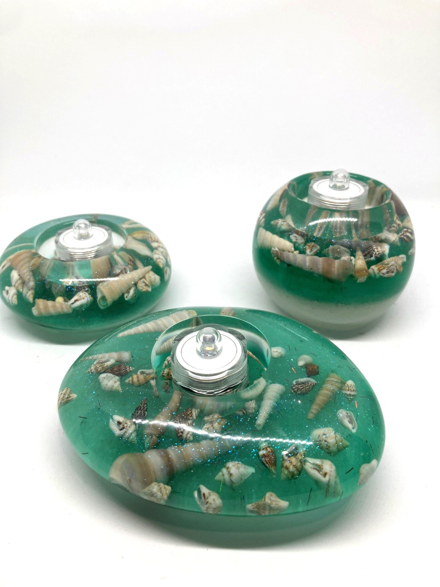 Large Resin Votive_Polished Stones_TurquoiseWithSeaShells_FromSideWithLEDLights.jpg