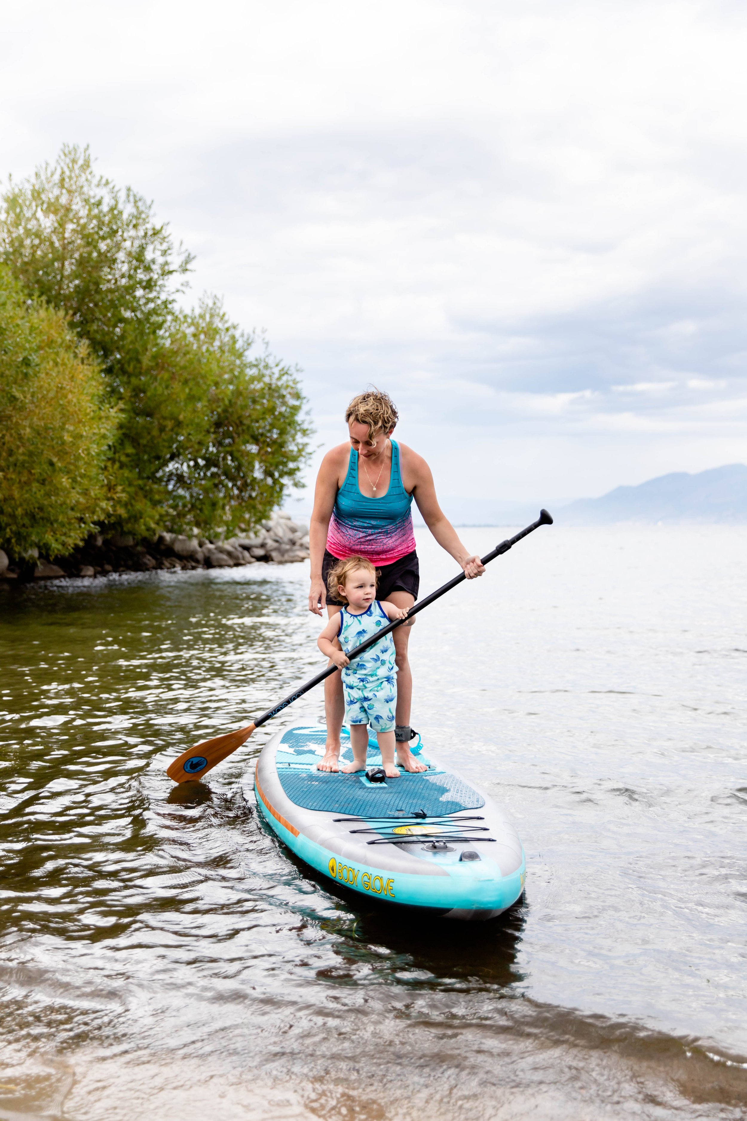 Stand up paddleboarding lesson on Big Lake, BC with certified instructors.