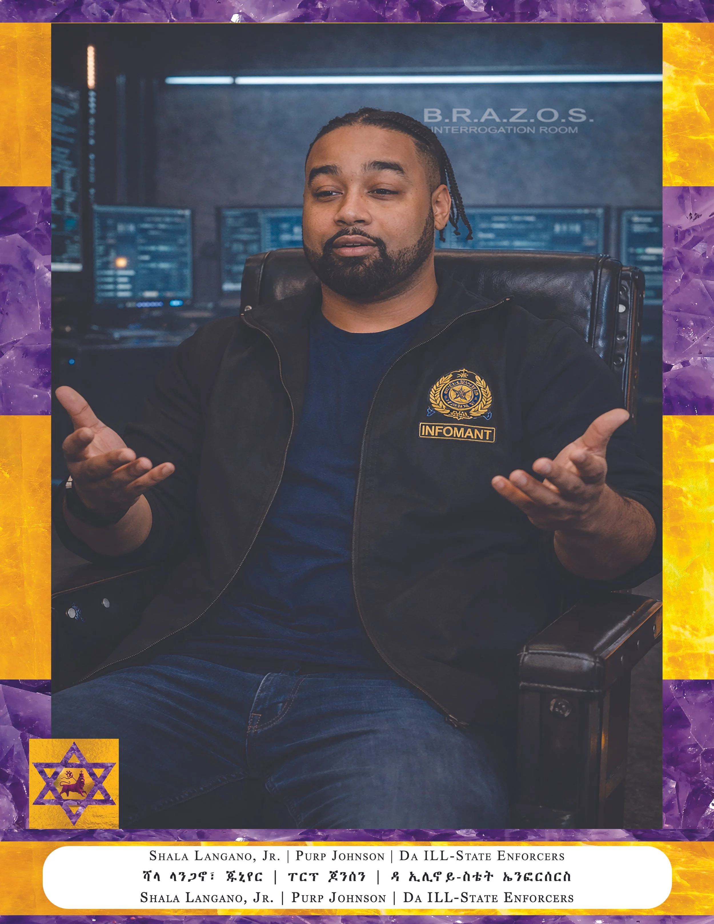 A man with a beard and braided hair sitting in front of computer screens in an interrogation room, wearing a black jacket with a badge on it. There is text at the top that reads 'B.R.A.Z.O.S. Interrogation Room' and text in multiple languages at the 