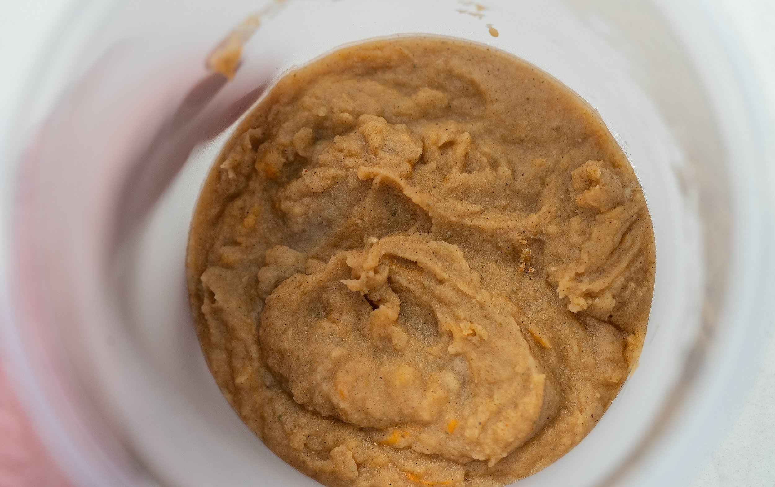 Turn off the heat and add three tablespoons of fruit fly media to the water and stir vigorously until the media mixes with the water. The mixture should be the viscosity of thick pancake batter or something similar. Pour the mixture into the 32-oz.