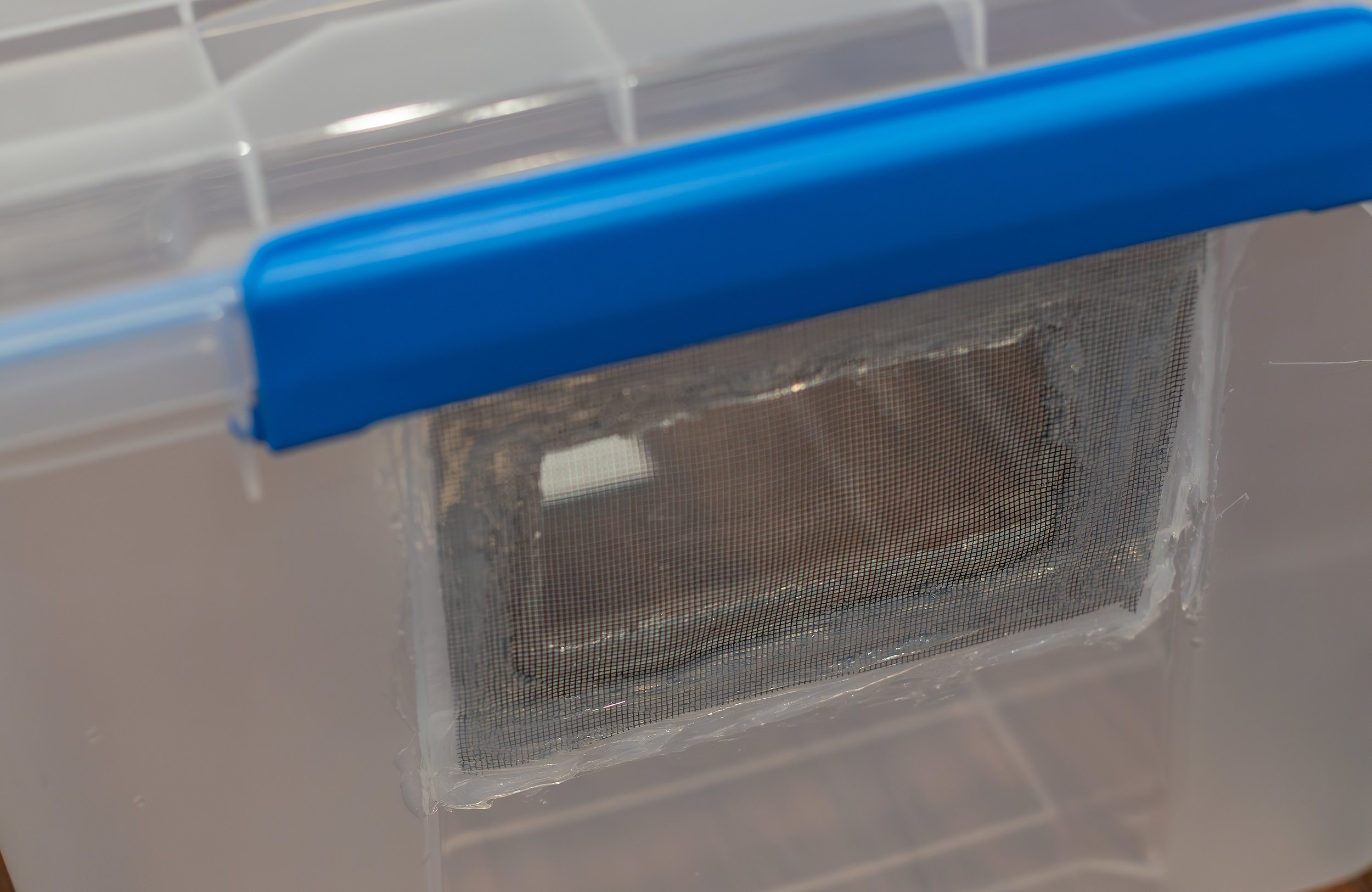 Next, I cut a hole in the side of the enclosure for airflow/air exchange. You can use a drill with a hole saw bit or simply use a woodburning tool to cut a 6x4” hole. Another hole of about the same size can be cut on the opposite side if more airfl