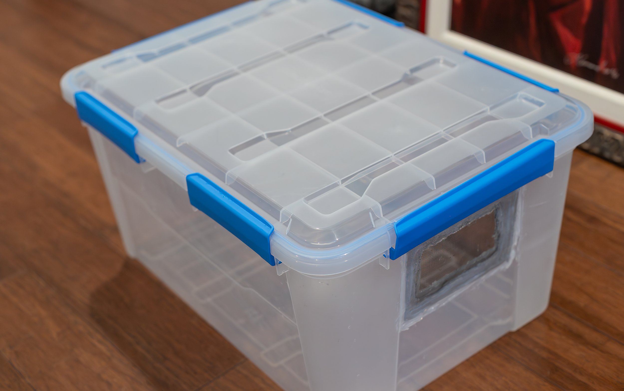 Let’s start with the quarantine enclosure. I like to use the Ezy Storage 50L/52.8 Quart Waterproof Clear Latch Tote IP-67 that measures 22.8x15x12.2”. They can be purchased at big-box stores like Home Depot and Target. This size fits neatly on my