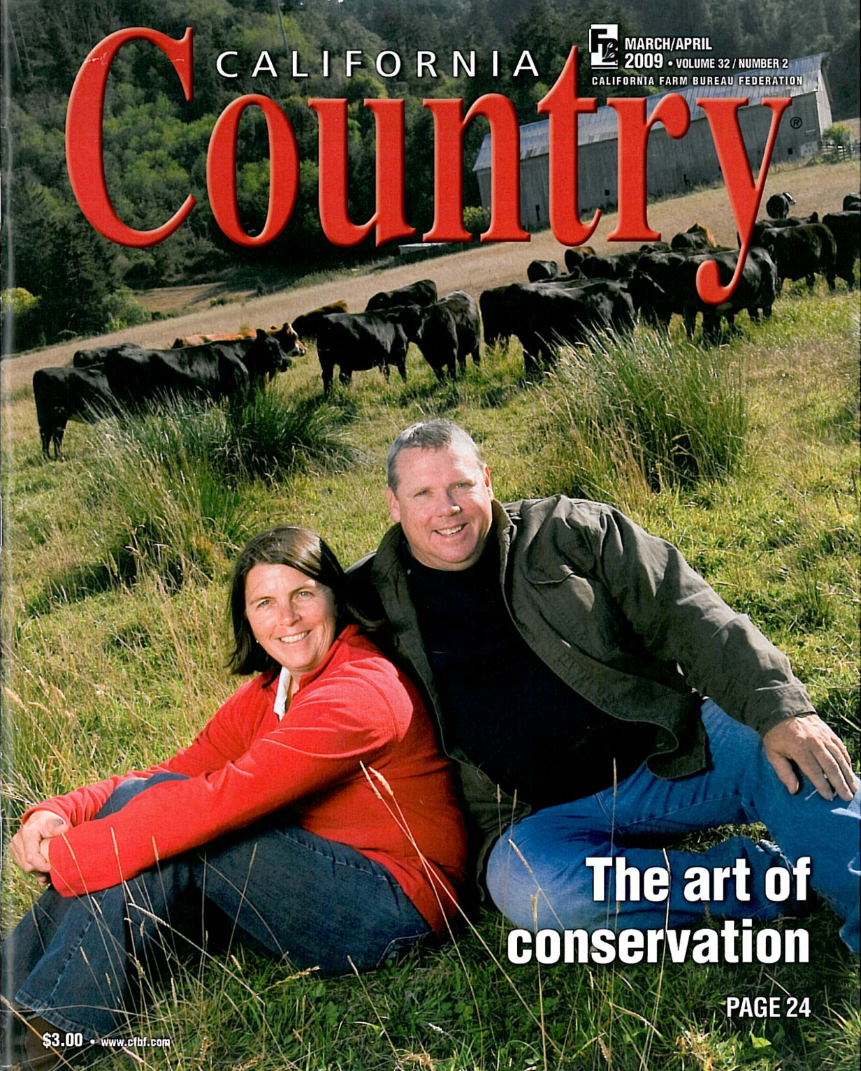 Cover of California Country magazine, March/April 2009, showing a smiling man and woman sitting on grassy land with a farm and cows in the background, and the headline "The art of conservation."