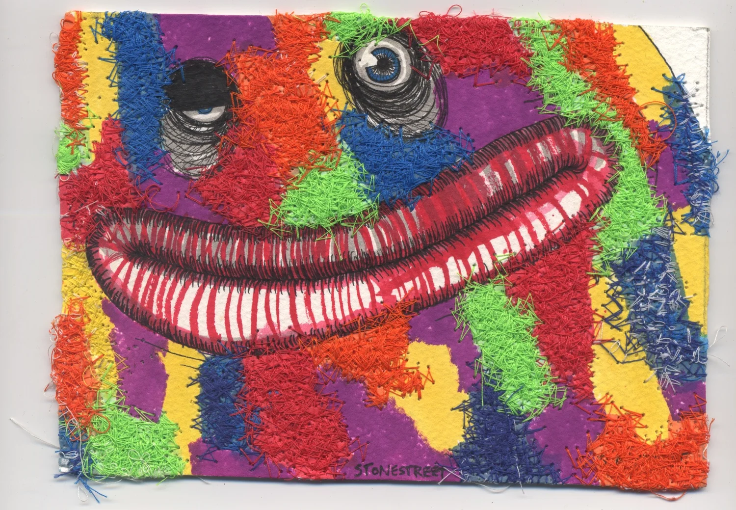 Embroidered Rainbow Face — Finished work