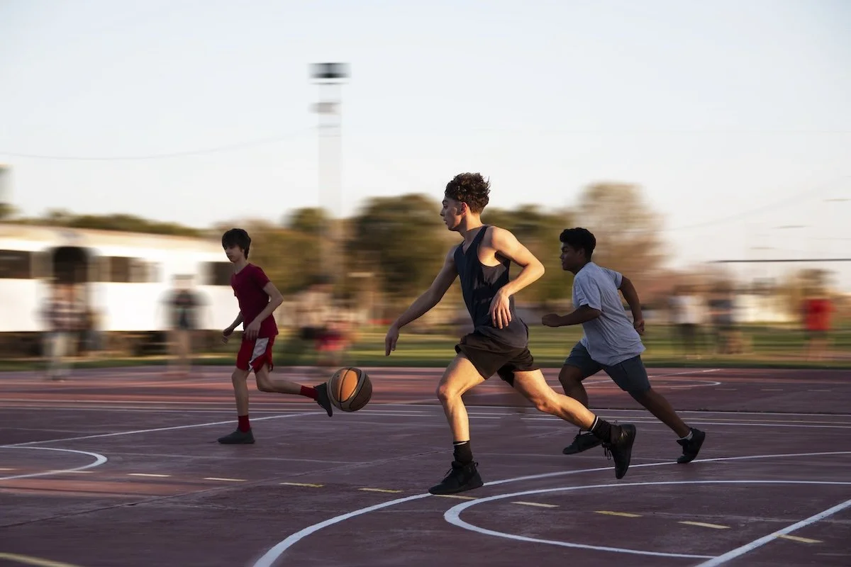 Youth athlete training with coach as part of long-term athletic development
