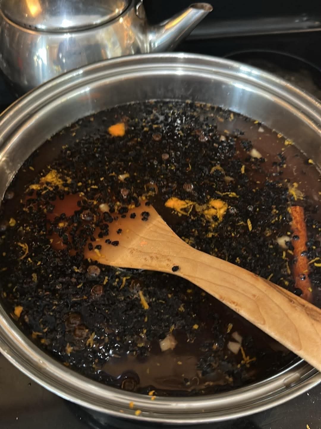 Getting a little witchy over here&hellip; 🧙&zwj;♀️🌙
A little brew, a little magic, and The Craft playing in the background.

Throwing it WAY back to the &rsquo;90s! 😂🖤

Brewing up some Elderberry magic for my Healing Hammocks crew! 🌿💜🍎✨

#Kitc
