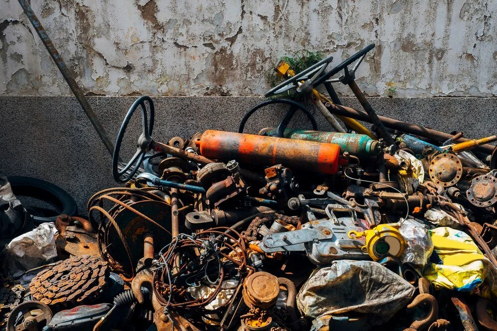 Hazardous Waste In A Pile of Recyclable Metal