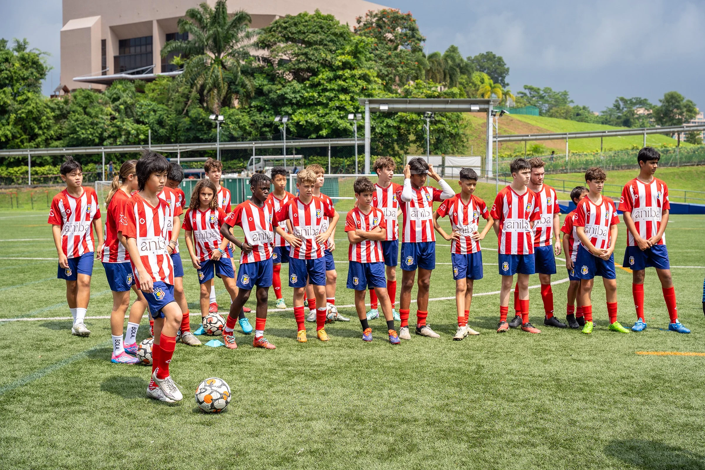 EuroAsia FC coaches and young players group photo at football training in Singapore