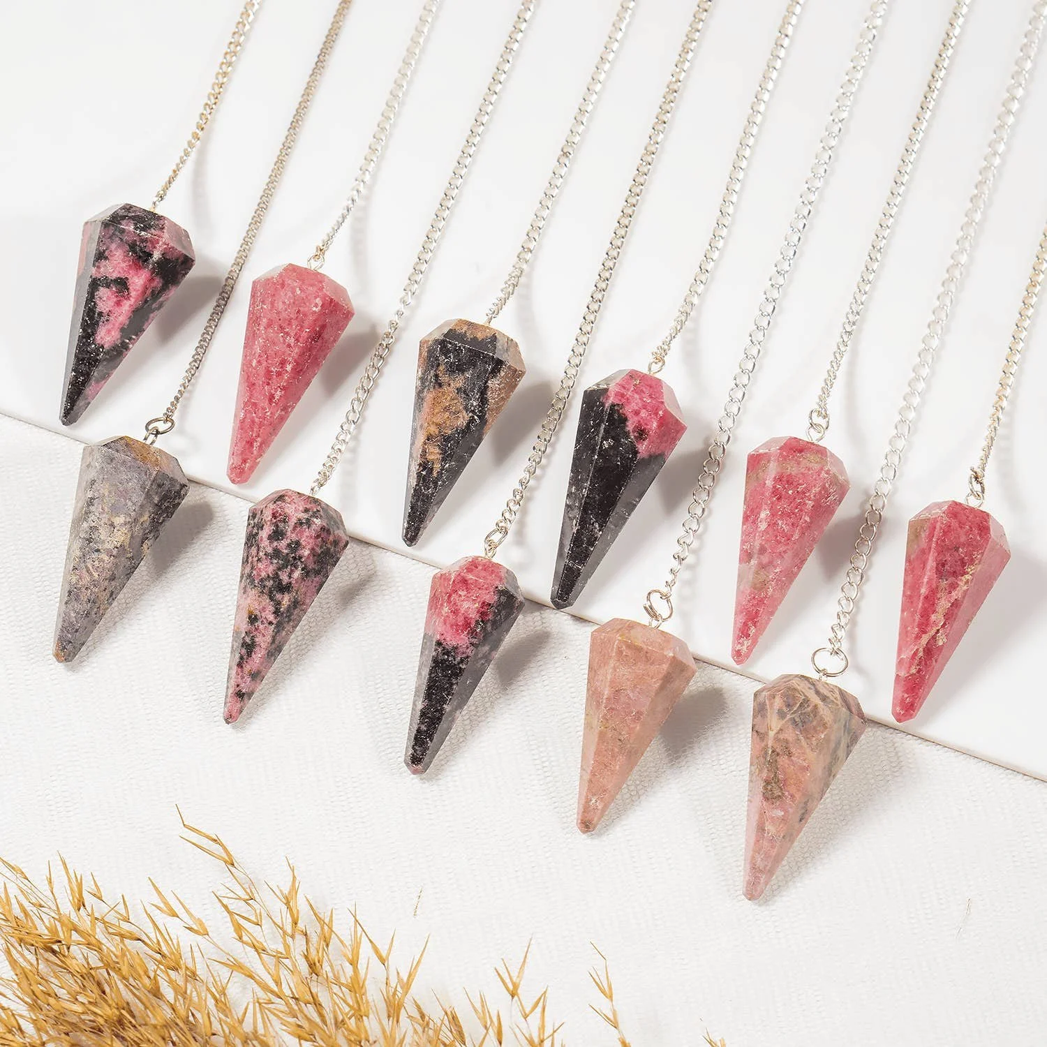 gemstone-dowsing-pendulum-chakra-healing-tool-reiki-tool-rhodonite.jpg
