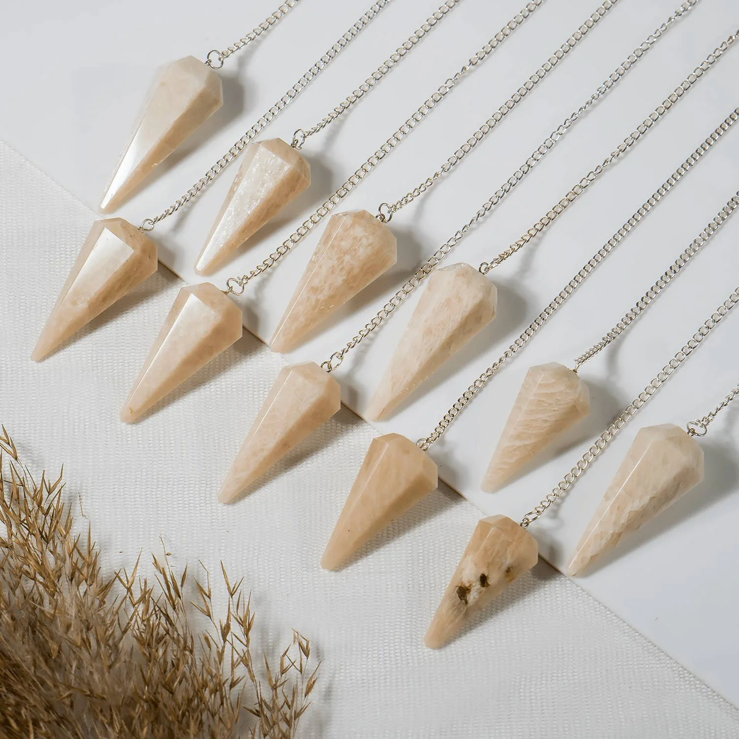 gemstone-dowsing-pendulum-chakra-healing-tool-reiki-tool-moonstone.jpg