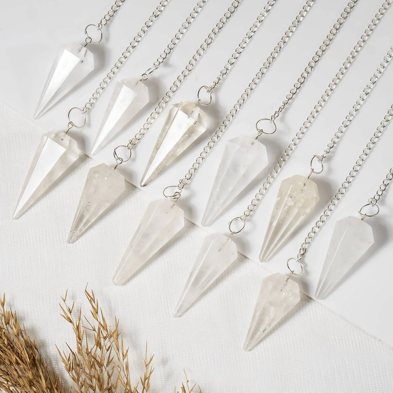 gemstone-dowsing-pendulum-chakra-healing-tool-reiki-tool-crystal-quartz.jpg