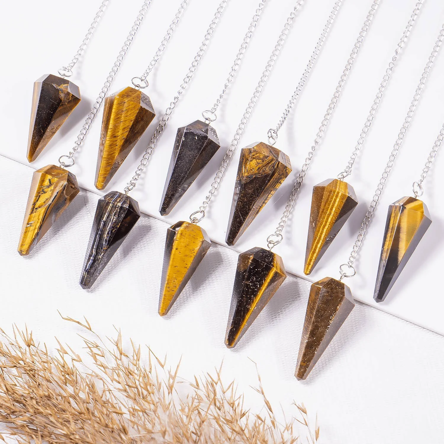 gemstone-dowsing-pendulum-chakra-healing-tool-reiki-tool-tiger-eye.jpg