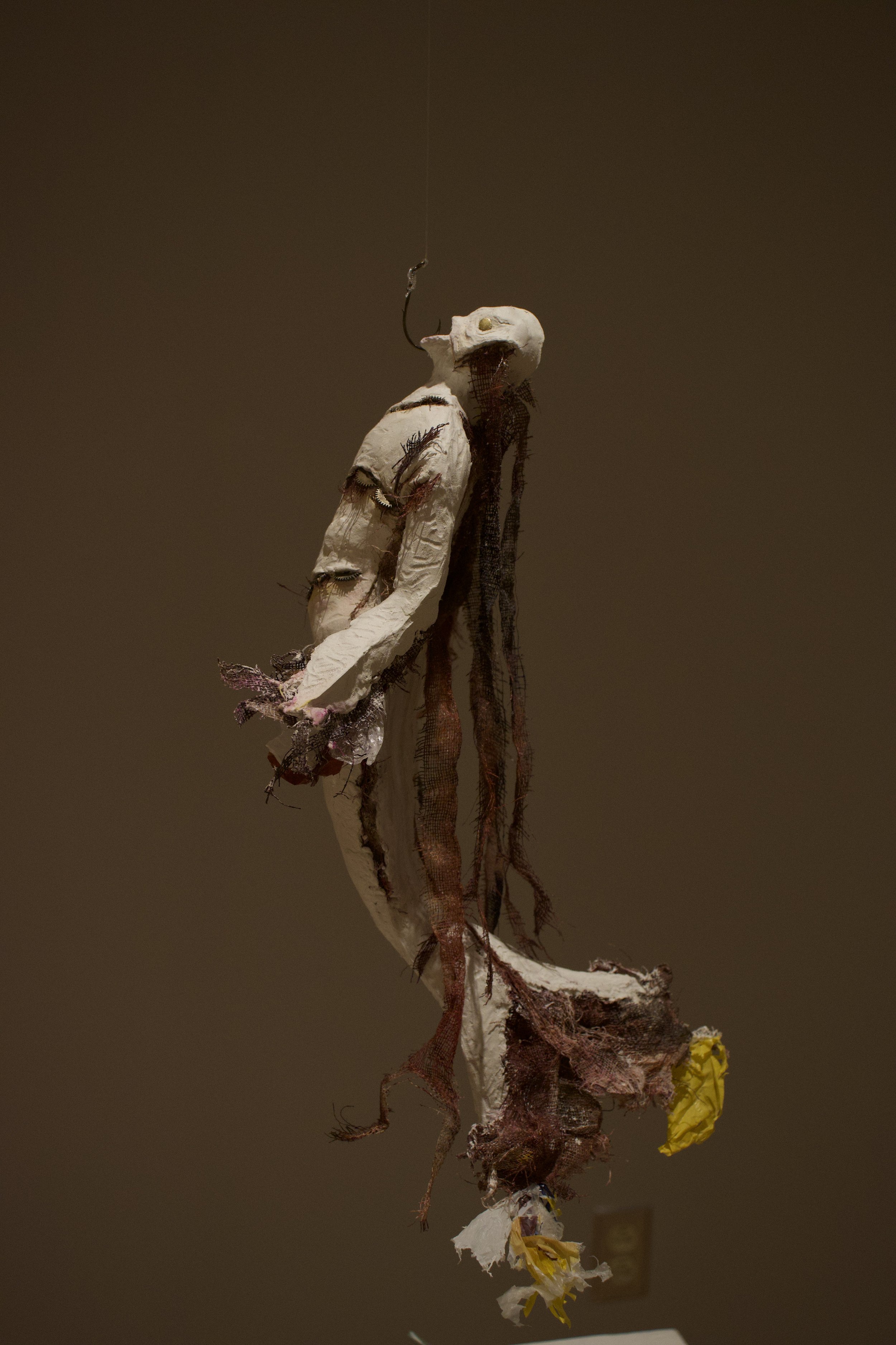 "The Fish" (2025) materials: aluminum wire, discarded plastic bags, yarn, cotton gauze, plaster, paper clay, mixed metals, pastels
