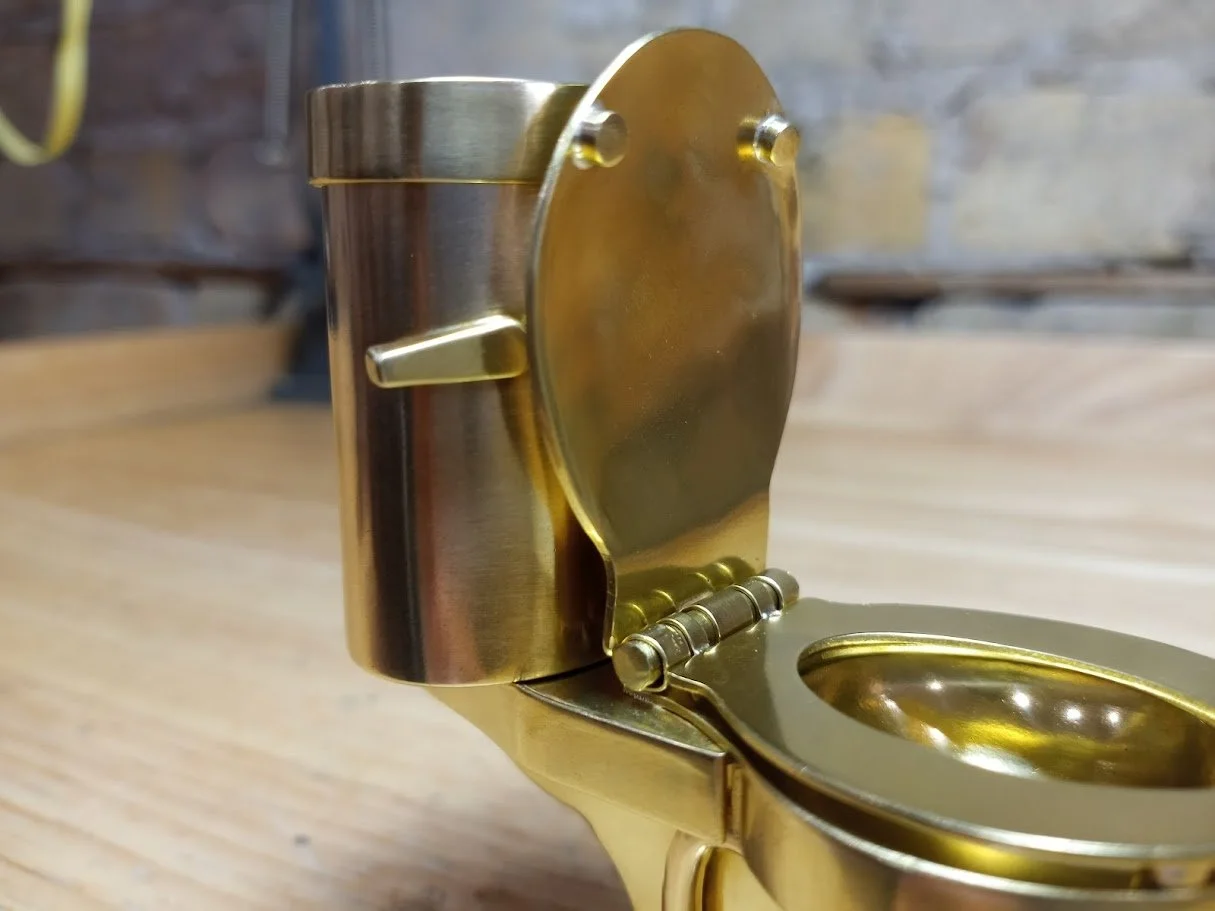 brass toilet close up.jpg