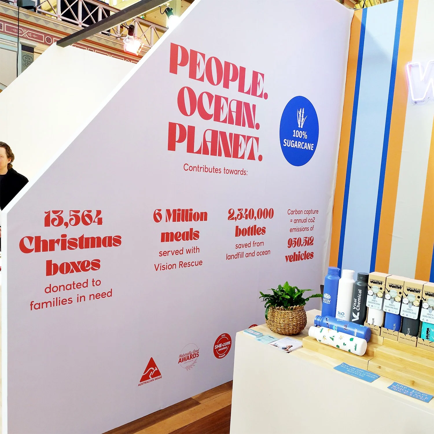 Internal wall of Worthy's Life in Style tradeshow stall, featuring key sell points and bold design.