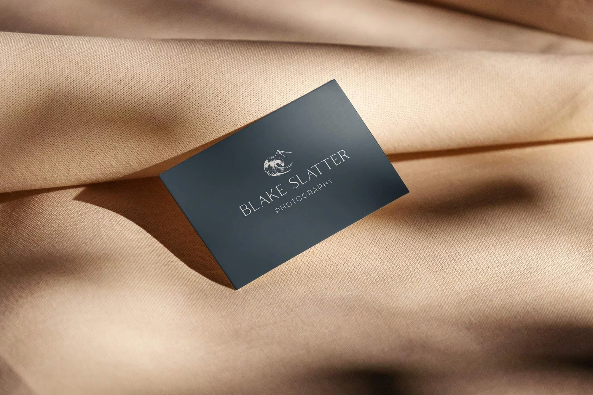 A navy blue business card featuring the Blake Slatter Photography logo.