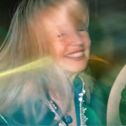 Child laughing inside a moving vehicle
