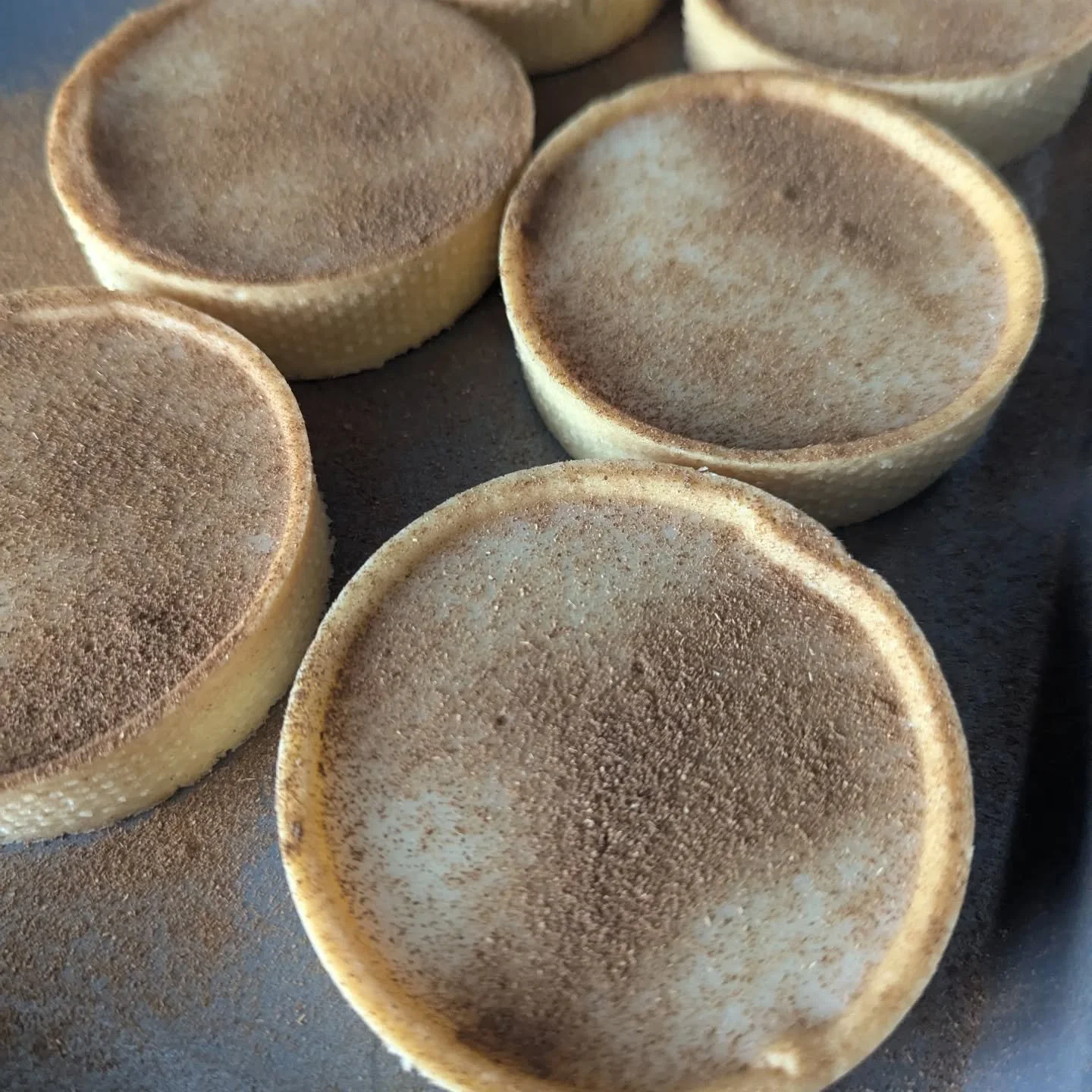 Milk tart

South African milk tart, I feel I insulted my South African friend when I suggested that this was just a custard tart with cinnamon, but upon biting into it myself, a cacophony of flavours awoke such a beautiful, elegant version of a custa