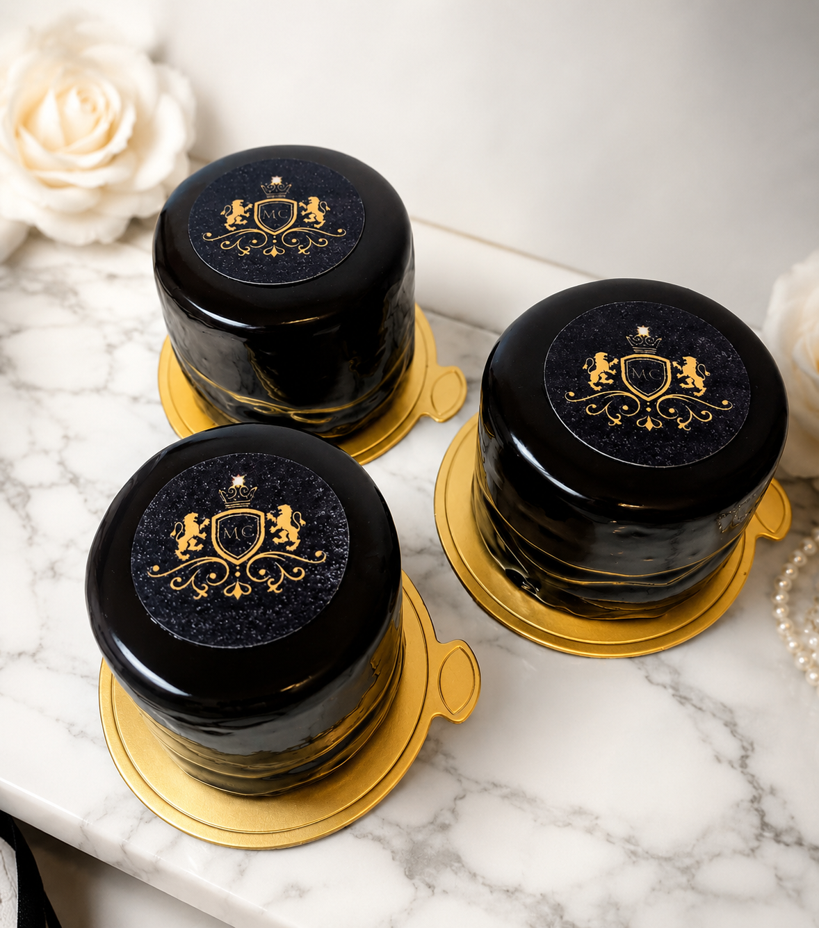 Contact us about creating branded desserts like these 3 mirror glazed chocolate gateaus